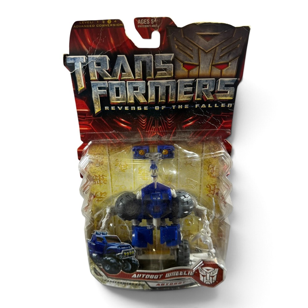 Transformers Revenge of the Fallen Autobot Wheelie Deluxe Class Figure 2009
